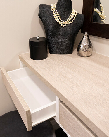 Natural oak built-in make up desk and drawer.