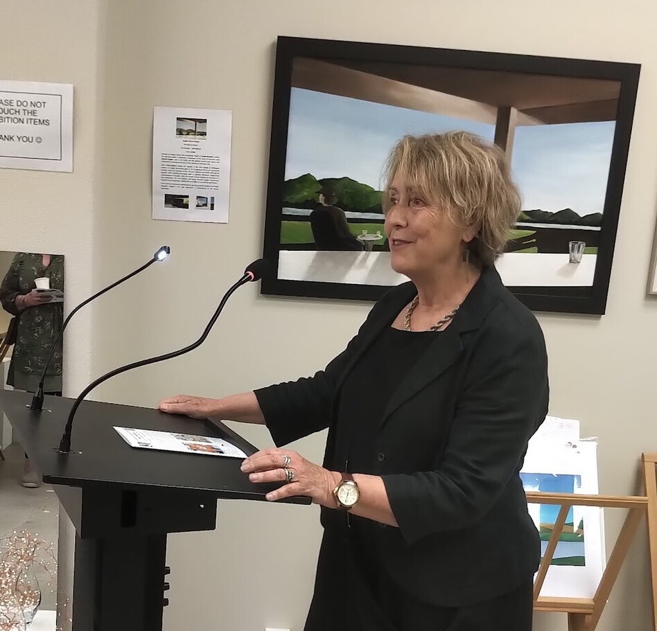 Juliet Roper addressing attendees at the opening night of the Yours Abstractly Showcase