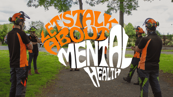 Team group photo with the text: Let's talk about mental health.