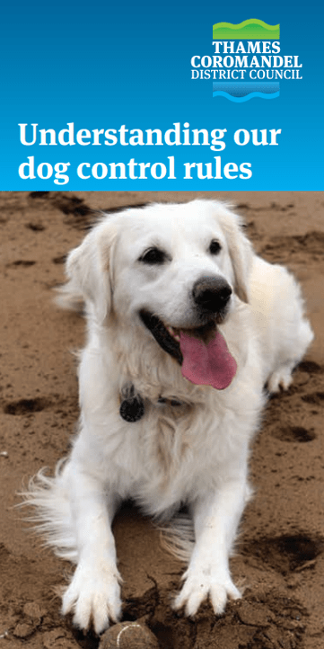 Cover page of TCDC's dog control brochure showing a dog lying on the beach with a ball at its feet