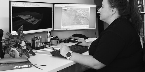 Hands using a laptop computer