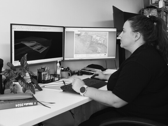 Hands using a laptop computer