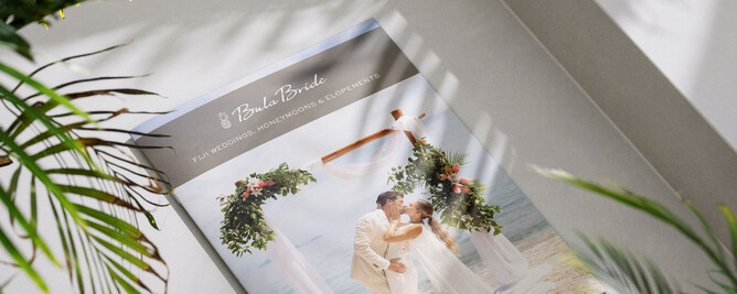Wedding brochure design layout styled with greenery illustrating strategic wedding business branding