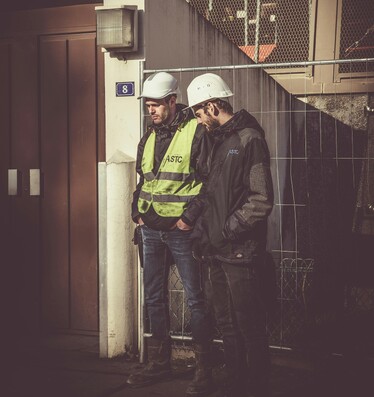 Exhausted tradies taking a break on-site