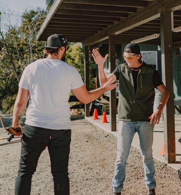 Tradies taking a break on-site to manage stress.