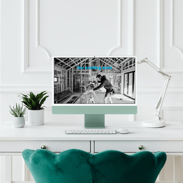 Monitor on a desk with Symphony Construction web page done by our web design for tradies team