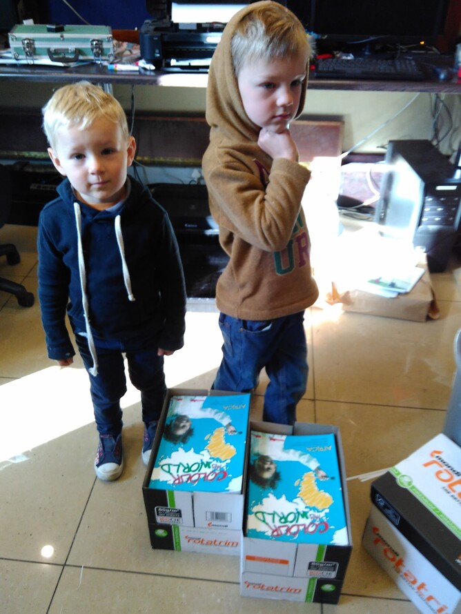 Helping Dad to print world flag colouring books for other kids