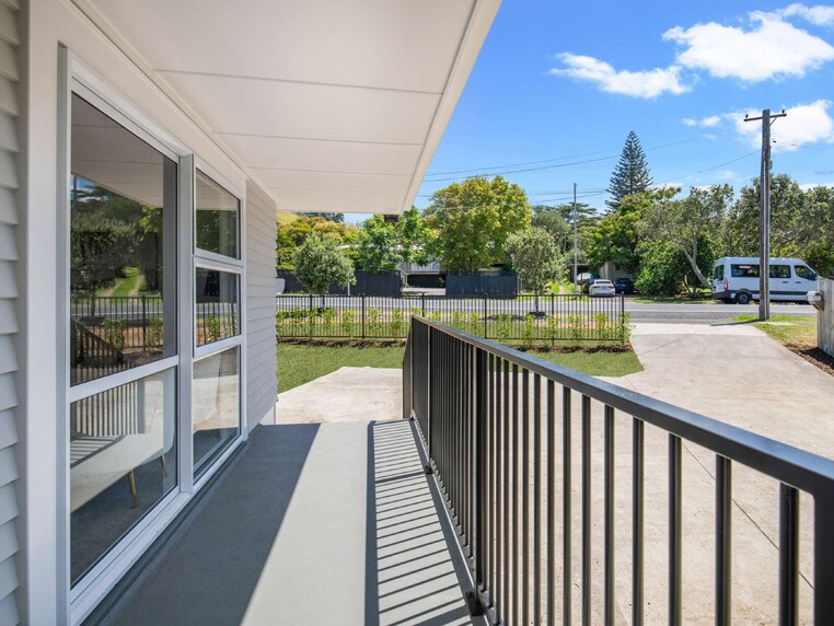 Image of a residential home renovation. Newly cladded, decked and landscaped by Auckland builders, Eden Construction. New Zealand.