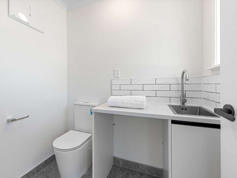 Image of a residential home renovation. Newly renovated utility room by Auckland builders, Eden Construction. New Zealand.