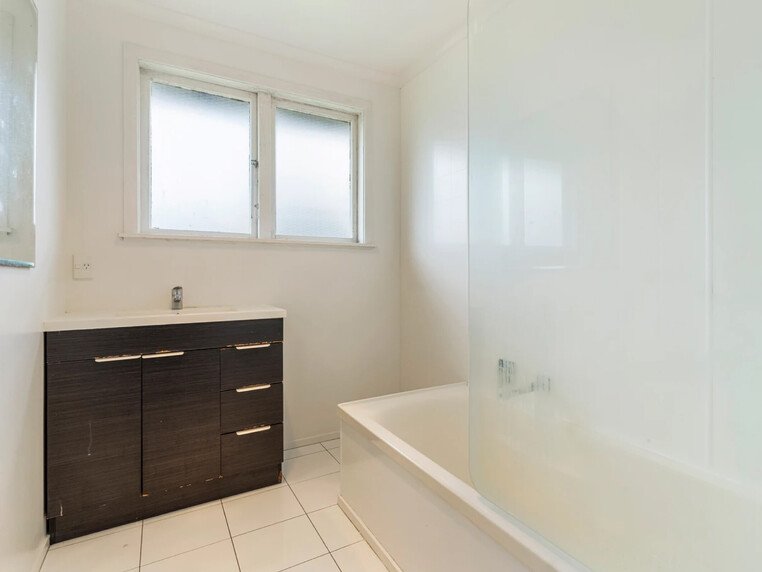 Image of a residential home renovation. Photo of bathroom before renovation.