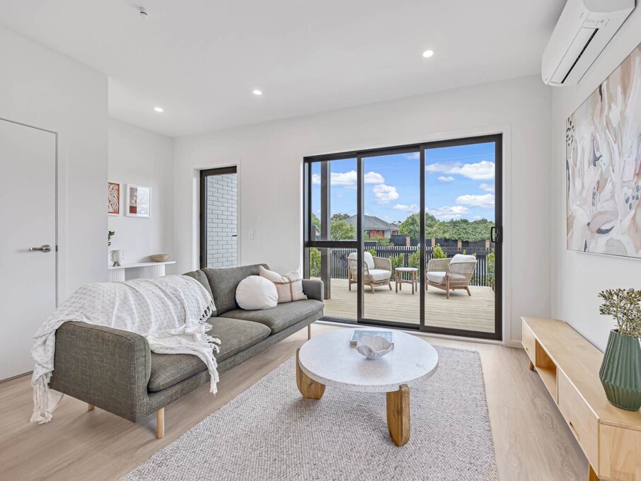 Image of modern living space inside one of six architecturally designed family townhouses on Tapu Road, Huapai, Auckland. Built by Auckland builders, Eden Construction. New Zealand.