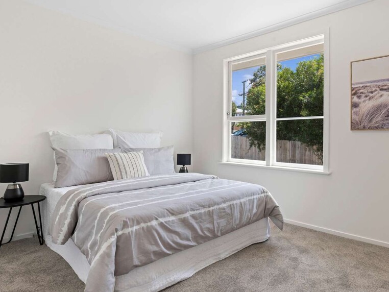 Image of a residential home renovation. Newly renovated bedroom by Auckland builders, Eden Construction. New Zealand.