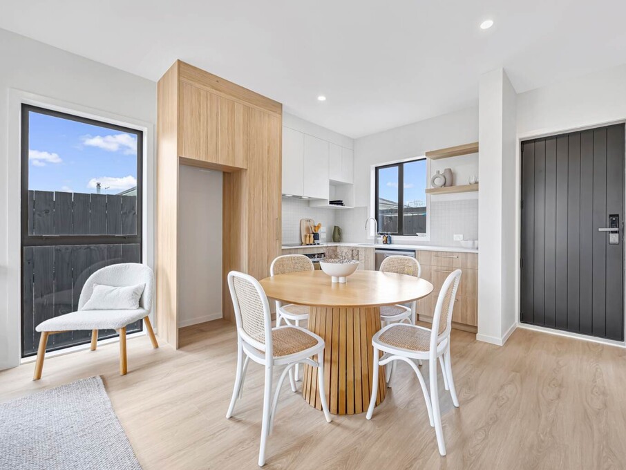 Image of modern living space inside one of six architecturally designed family townhouses on Tapu Road, Huapai, Auckland. Built by Auckland builders, Eden Construction. New Zealand.