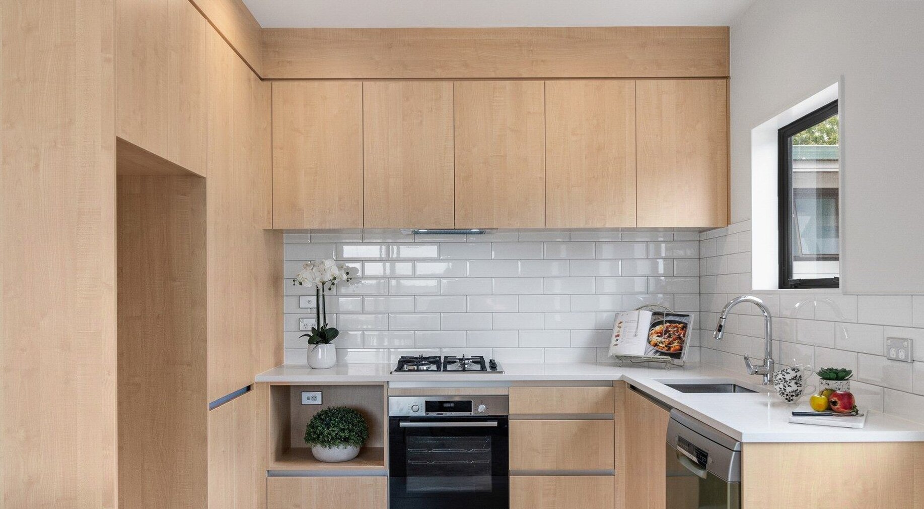 Image of modern kitchen at residential new build family home on Subritzky Avenue, Mount Roskill, Auckland. Built by Auckland builders, Eden Construction. New Zealand.