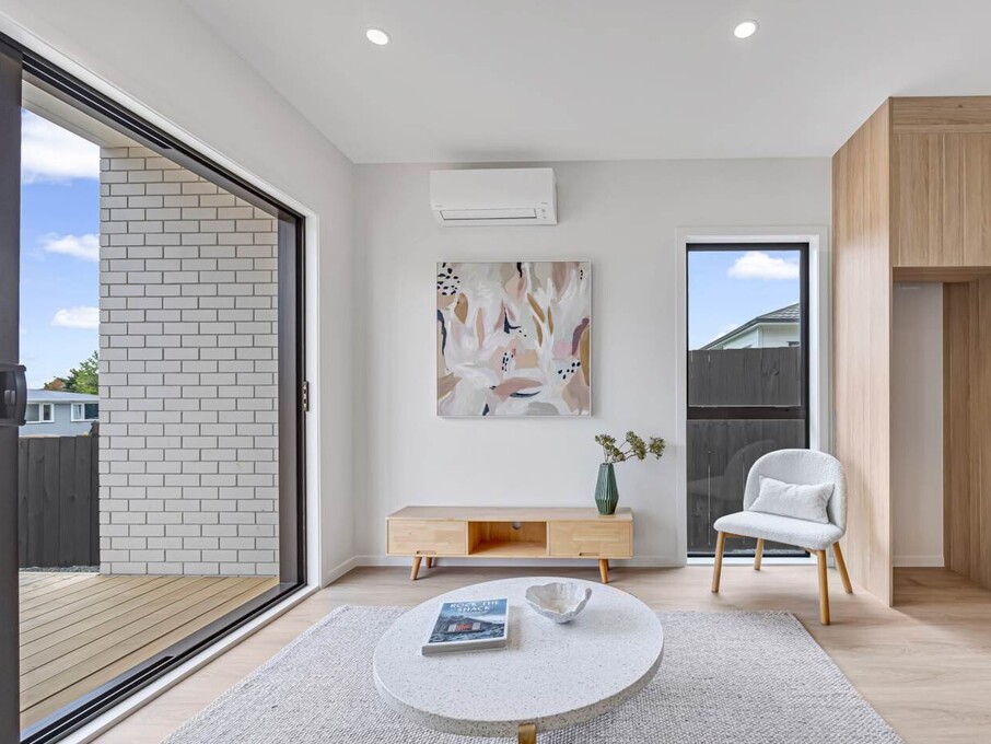 Image of modern living space inside one of six architecturally designed family townhouses on Tapu Road, Huapai, Auckland. Built by Auckland builders, Eden Construction. New Zealand.