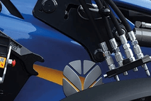 1 - When driving in, the front loader slides along the attachment until the locking pin meets the upper end of the connection support.