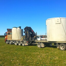 Drainpro truck with septic tanks on trailer