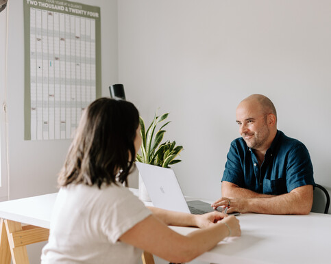 Experienced business professionals collaborating to elevate team performance