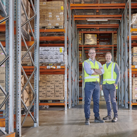 Craig Brown Photographer's image of two men standing in a warehouse