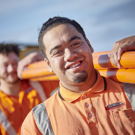 Craig Brown Photographer's image of Schick workers carrying pipes
