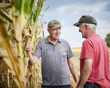 Craig Brown Photographer's image of two men discussing maize crops