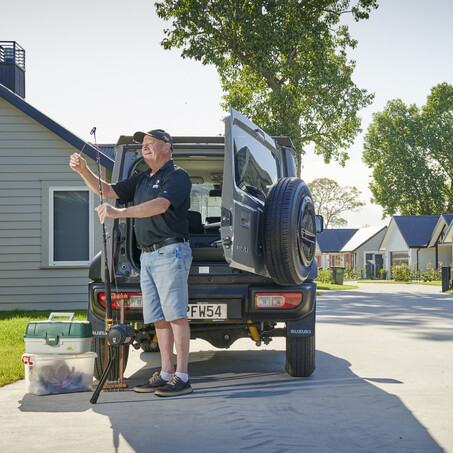 Craig Brown Photographer's image of an elderly man loading car to go fishing
