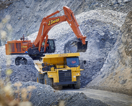 Craig Brown Photographer's image of a jswap digger loading a truck