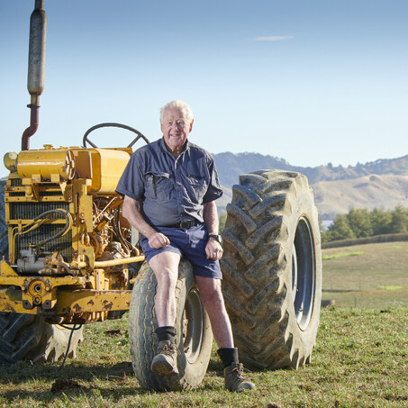 Craig Brown Photographer's portrait image of a man sitting on a tractor