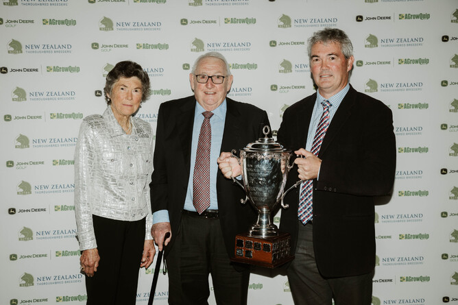Mark Chitty (right) pictured with his parents Carolyn and Ron after receiving his award for Personality Of The Year at the New Zealand Breeding Awards. - Photo: Christine Dawkins