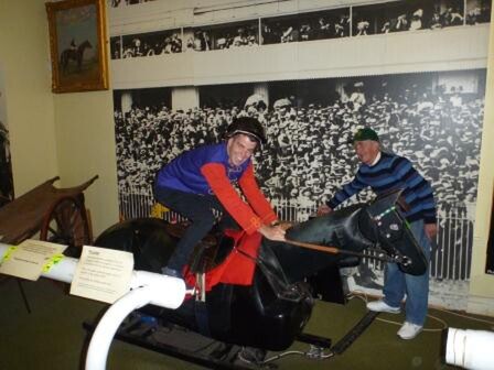 Jamie tries out The Queen's silks at the the Horse Racing Museum