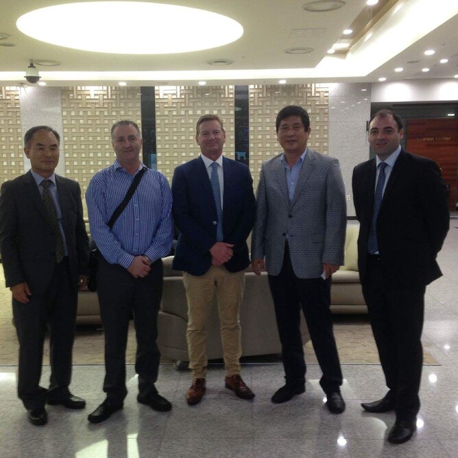 Trainer David Miller, second from left, with race officials and guests at a Busan race meeting in South Korea this month.