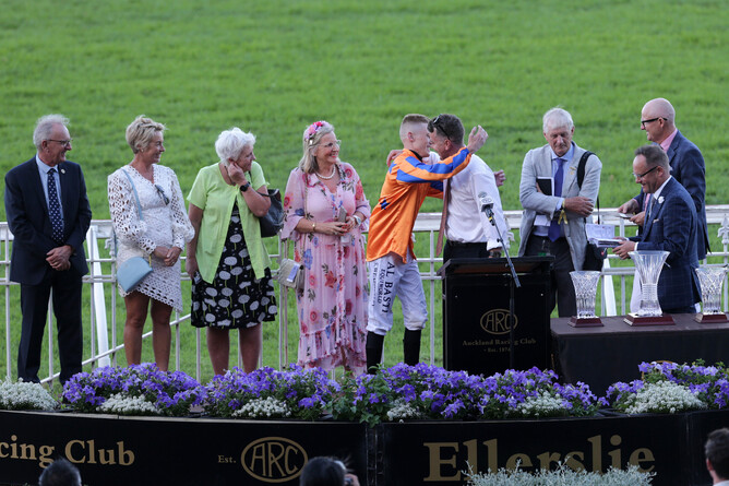 Sam Weatherley embraces Jamie Richards during the winning presentation for the Karaka Million 3YO Classic (1600m) Photo Credit: Trish Dunell