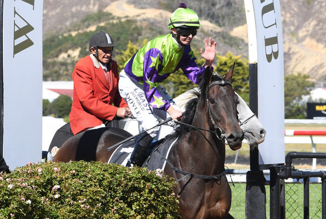 Joe Doyle returns to scale on Gr.3 Wentwood Grange Cuddle Stakes (1600m) winner Hi Yo Sass Bomb. - Photo: Peter Rubery (Race Images Palmerston North)
