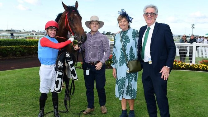 Owners John and Carole Lynskey pose with Puntura after his win at Doomben - Photo: Grant Peters
