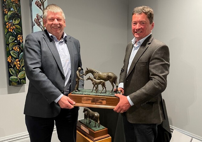 Jeff Drinkwater (left) receives the John A Higgs Trophy for Contribution. - Photo: Supplied