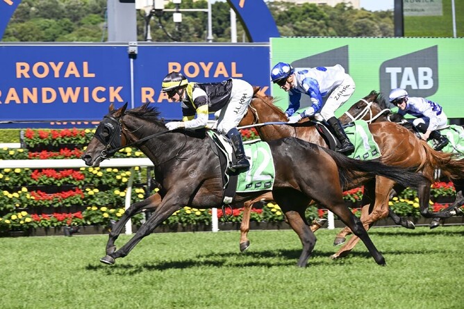 Jamie Kah and Good Banter cross the line as winners of the Gr.3 Adrian Knox Stakes (2000m) at Randwick -  Photo: bradleyphotos.com.au