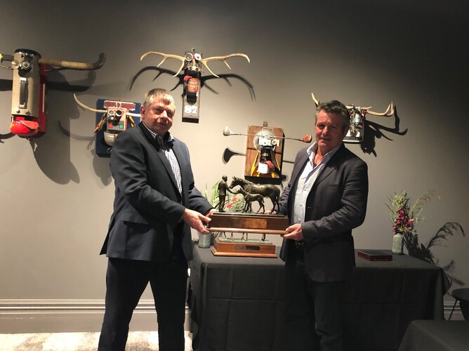 Jeff Drinkwater presenting the John A Higgs Awards to Chris Rutten