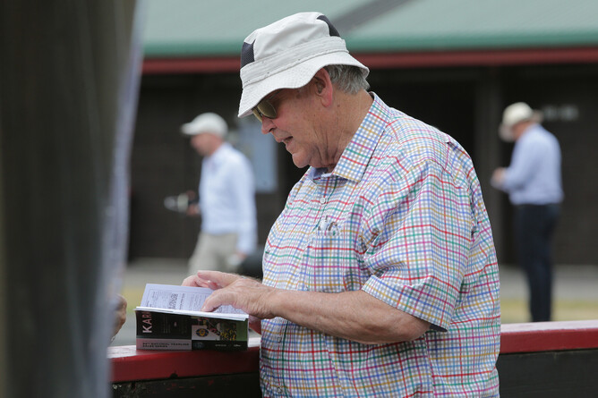 Christopher Grace perusing the Karaka catalogue in 2020. - Photo: Trish Dunell