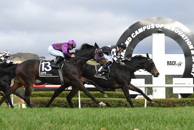 Islington Lass powers away from Lincoln Falls to win Saturday’s Listed James Bull Rangitikei Cup (1600m) at Trentham.  - Photo: Peter Rubery