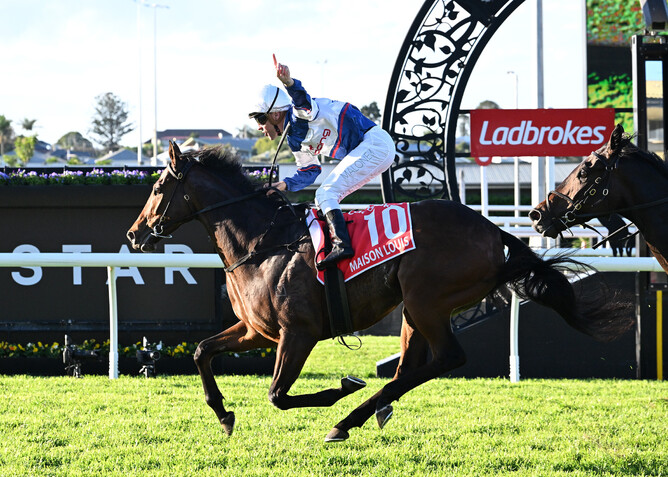 Maison Louis powers home to win the Queensland Derby. - Photo: Grant Peters