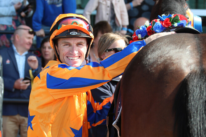 A smiling Josh Parr after his win aboard Campionessa - Race Images South