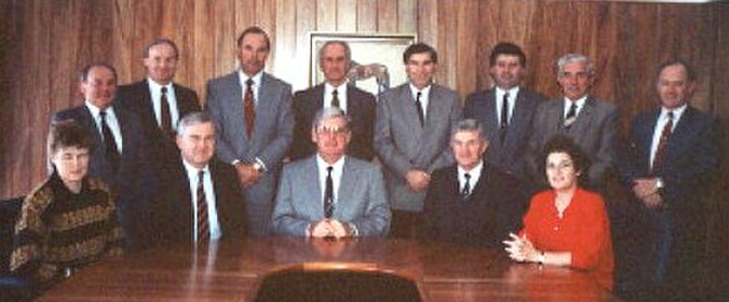 President Ross Finlayson (centre) photographed in 1990 with the Council and Executive staff in the Boardroom of the newly opened NZTBA office building at Ellerslie Racecourse.