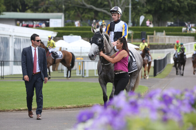 Co-trainer Andrew Forsman with White Noise and rider Ryan Elliot after their Ellerslie victory Photo Credit: Trish Dunell