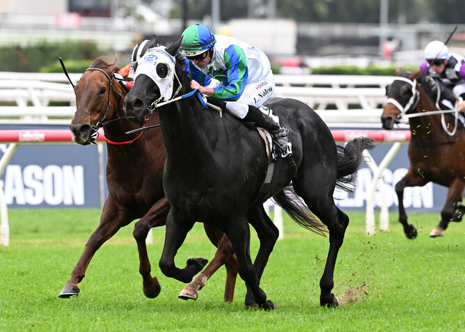 I Wish I Win strides past Bella Nipotina to win the Gr.1 Kingsford-Smith Cup at Eagle Farm.  - Photo: Grant Peters, Trackside Photography
