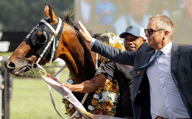 Trainer Stephen Marsh gives his newest Group One winner Mercurial a pat after winning the Gr.1 Telegraph Stakes at Trentham - Photo: LOVERACING.NZ