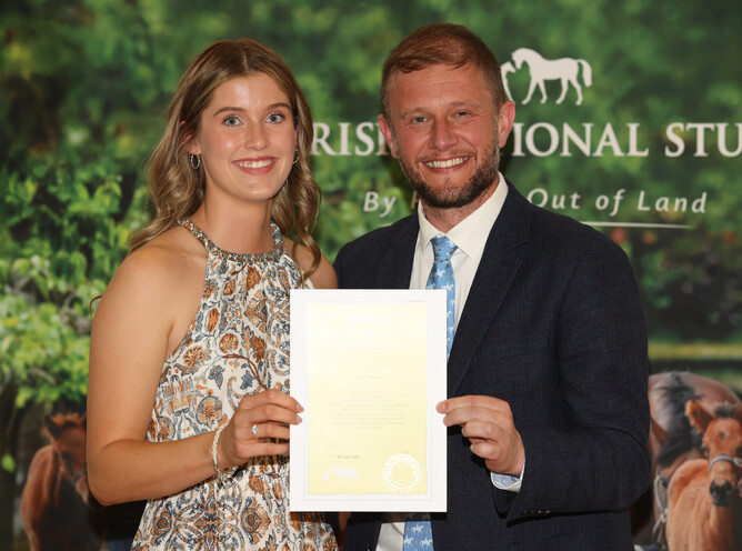 Alice Wilkinson receives her Thoroughbred Breeding Management certificate from Irish National Stud CEO Cathal Beale.