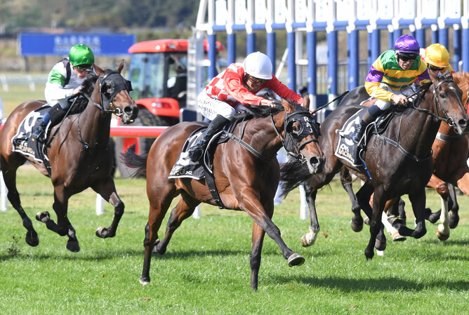 Apostrophe and Masa Hashizume race away with the Gr.3 Martin Collins New Zealand Manawatu Breeders’ Stakes (2100m) at Trentham.   - Photo: Race Images PN