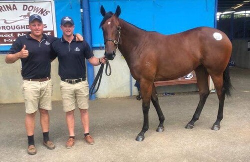 David Morris and Jason Thomasen with their Turn Me Loose filly in Melbourne. - Photo: Windsor Park Facebook