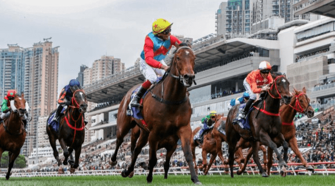 Ka Ying Rising winning the Gr.1 Queen’s Silver Jubilee Cup (1400m) on Sunday.  - Photo: HKJC