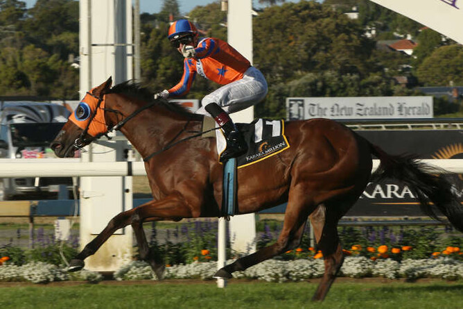 Opie Bosson celebrates as Melody Belle scores a superb win in the Karaka Million.